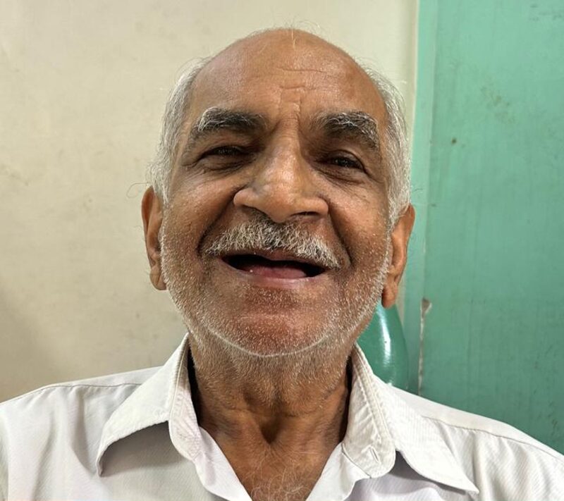 Patient at Niyaz Dental Unit before complete denture treatment